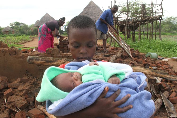 FLOODS: Nightmarish start to new year,. . . as floods send families clutching onto tree branches