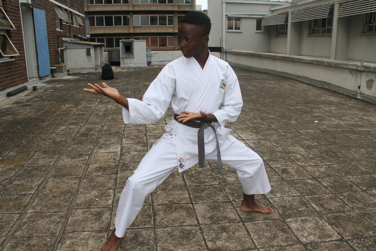Karate kid keeps eyes on gold