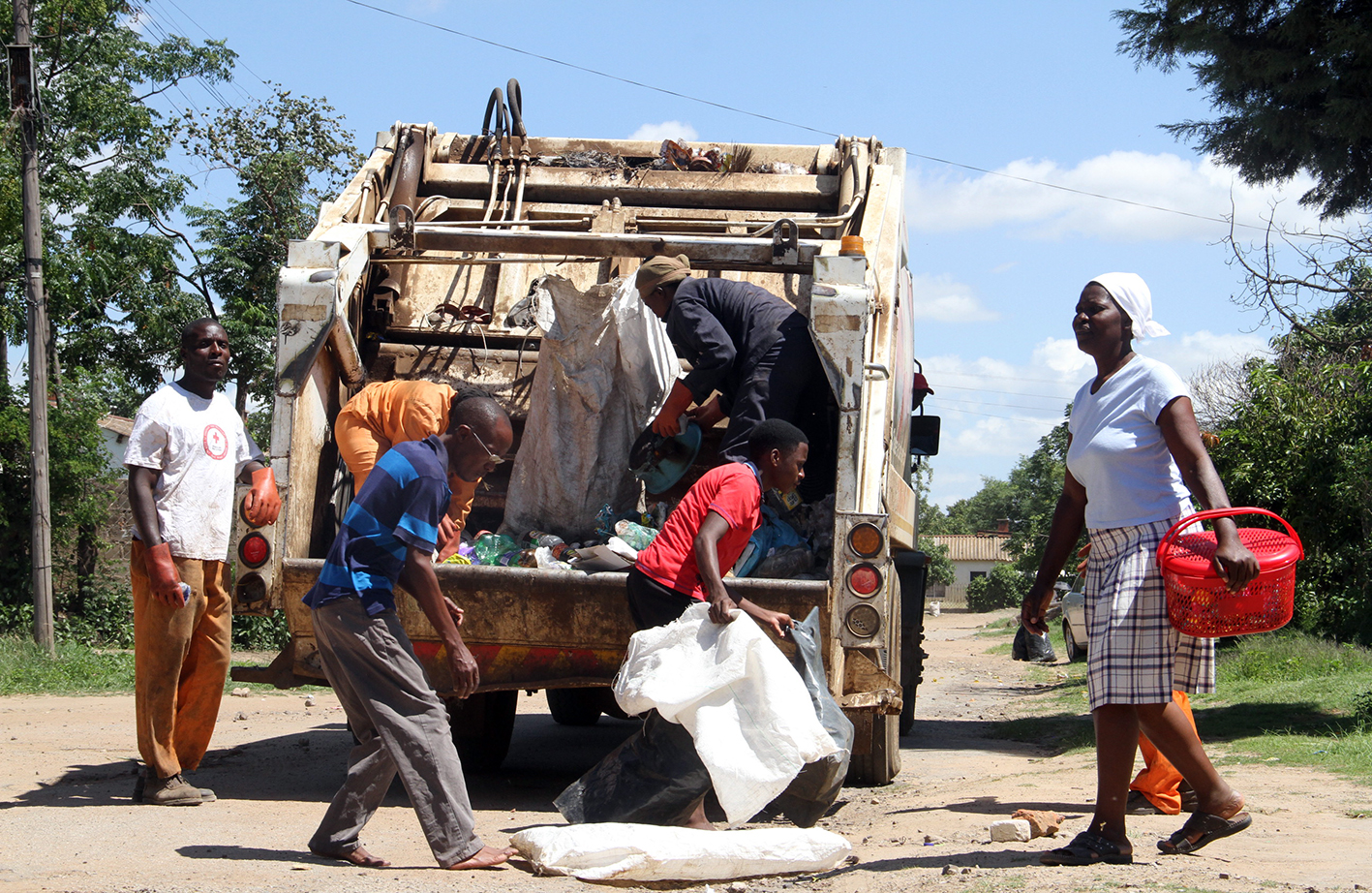 NEW: Man run over by council dump truck
