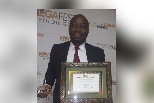 Zimpapers executive scoops top award