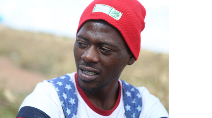 Peter Moyo cheers fans