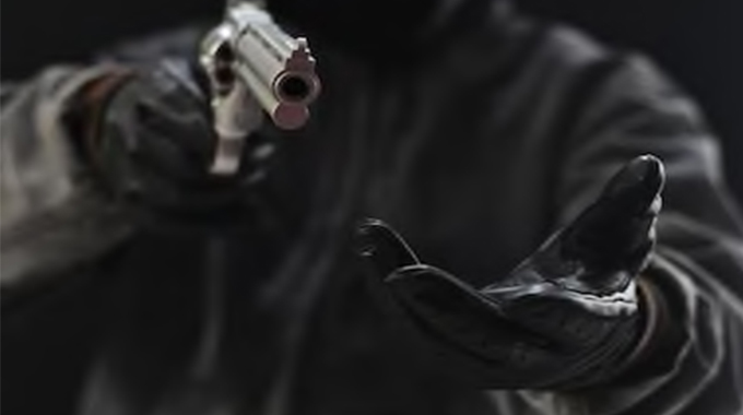 One of the robbers was armed with a pistol