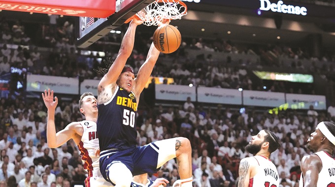 Gordon guides Nuggets on the brink of title