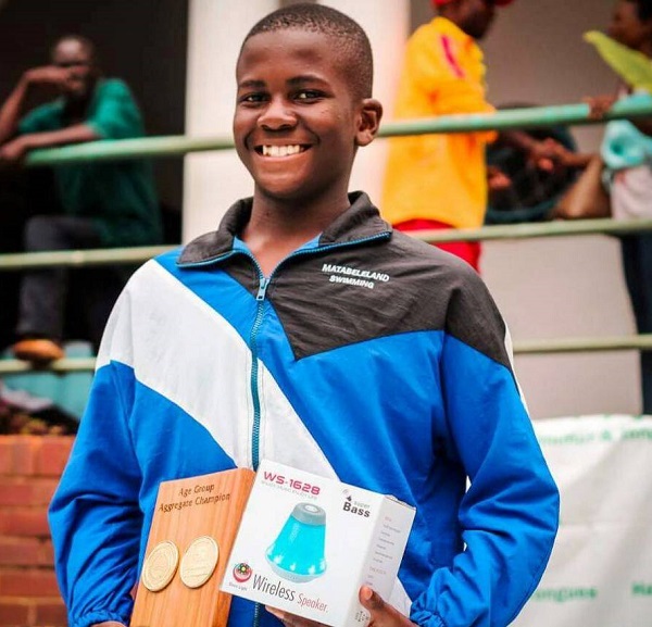 Up-and-coming swimmer breaks records