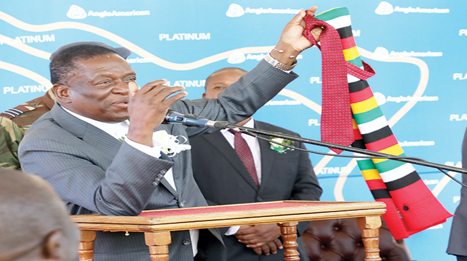 ED donates tie, scarf to pupils