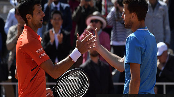 Thiem downs Djokovic to book Nadal final