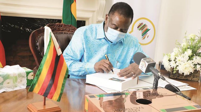 Africa finds its voice . . . as President signs Factbook