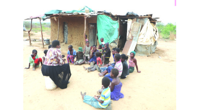 Teacher takes lessons to squatter camp
