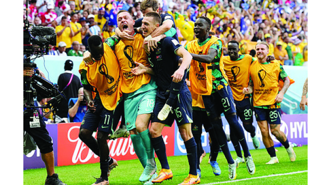 Australia squeeze past Tunisia