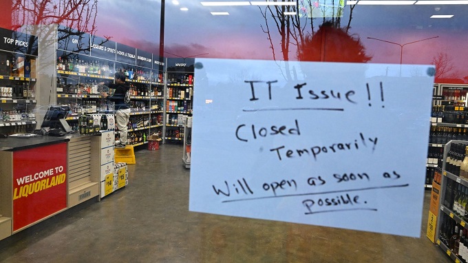 Mass IT outage hits companies around the world as planes grounded and train services affected