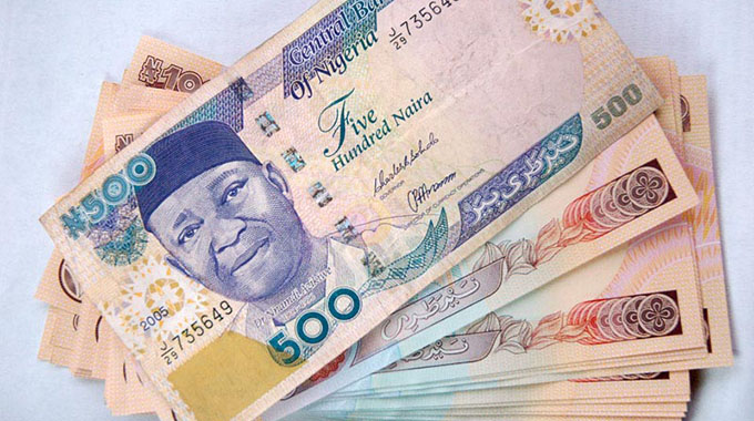 Naira plunges as Nigeria eases currency controls