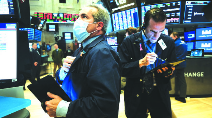 NYSE opens with masks, plexiglass