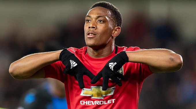 Martial hat-trick powers United to big win