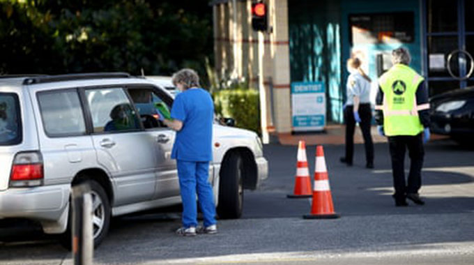New Zealand tightens Covid-19 border measures in ‘dangerous new phase’