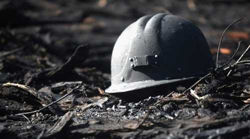 SIX MINERS SWEPT TO THEIR DEATHS IN SHAFT: Police name victims