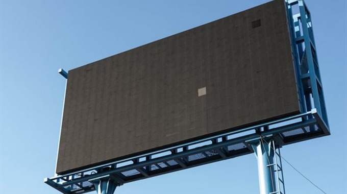 Two in court over illegal billboard