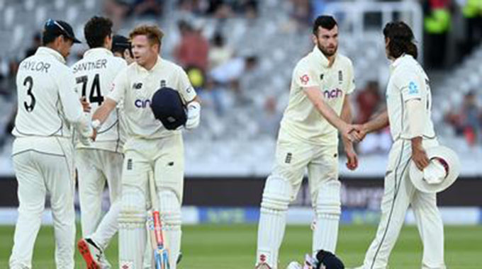 England fight for draw in first Test