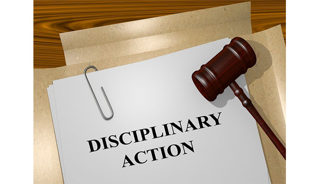 Court stops city official disciplinary hearing