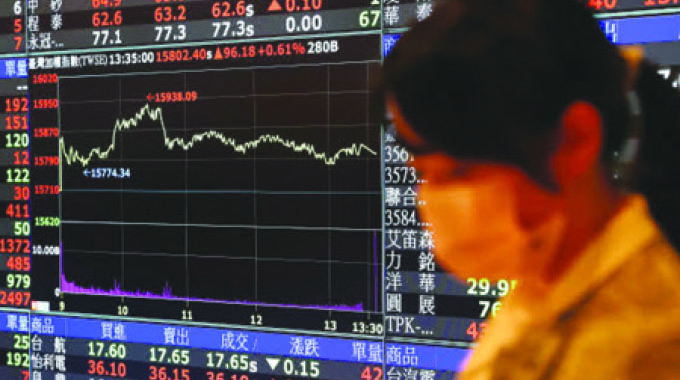 Asian shares start week on cautious note