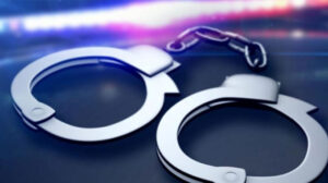 One suspect was arrested after being found in possession of a firearm stolen from security guards at the premises