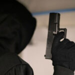 The suspects were armed with pistols and concealed their identities with black balaclavas