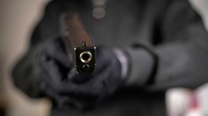 The gang, allegedly travelling in a white Nissan Navara, targets unsuspecting victims by approaching them under the guise of investigating illicit fuel dealings, before brandishing a pistol and demanding money