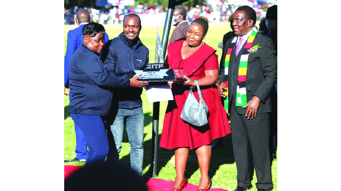 Econet scoops best ZITF stand award
