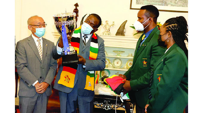 President honoured with karate black belt