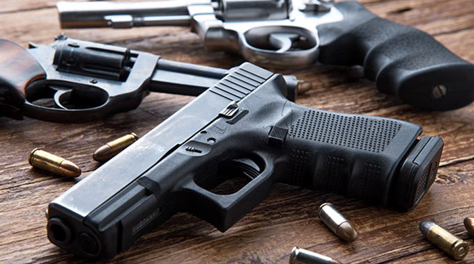 2 men arrested for possessing unregistered firearms