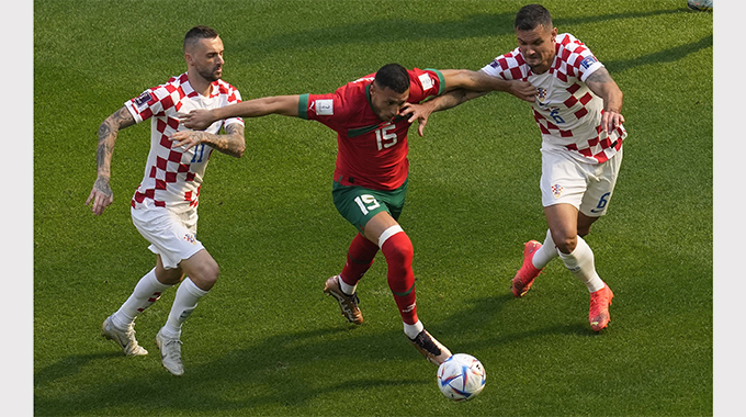 Well-drilled Morocco hold Croatia