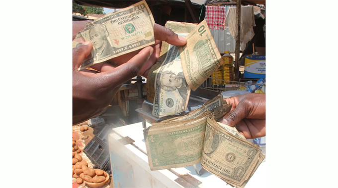 Making a living from tattered US dollar bills