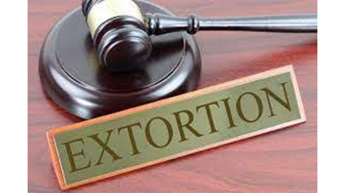 CIO officer jailed for extorting Brian Michael Jackson