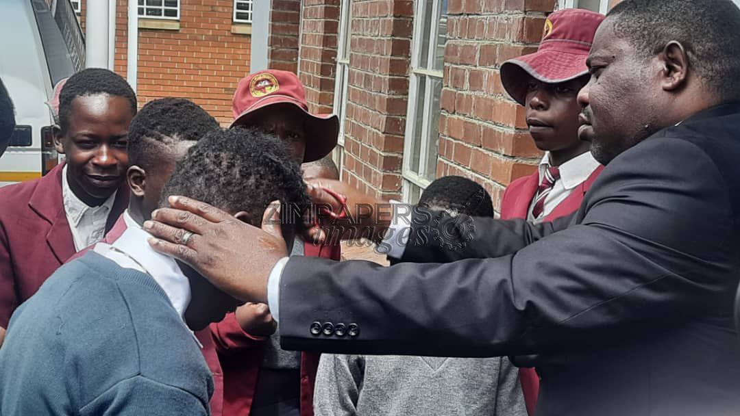 School headmaster sparks debate over haircuts