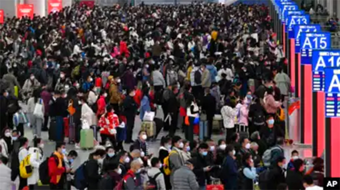 China ends quarantine for overseas travellers