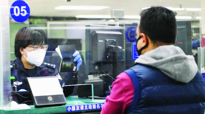 China to resume issuing visas, eases entry policies