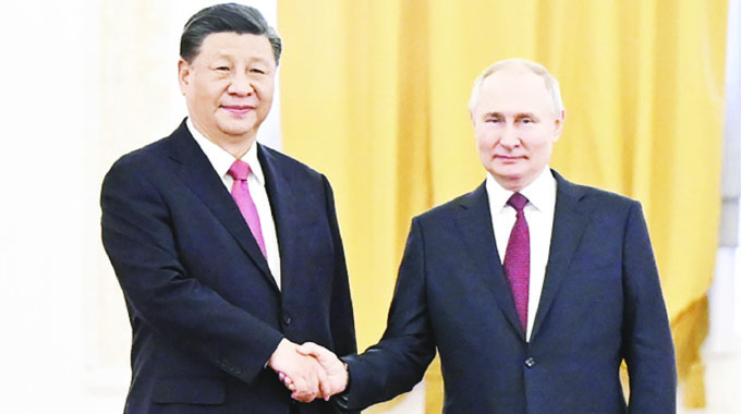 Multiple agreements crown historic Putin, Xi meeting