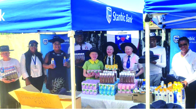 Stanbic donates to people with albinism