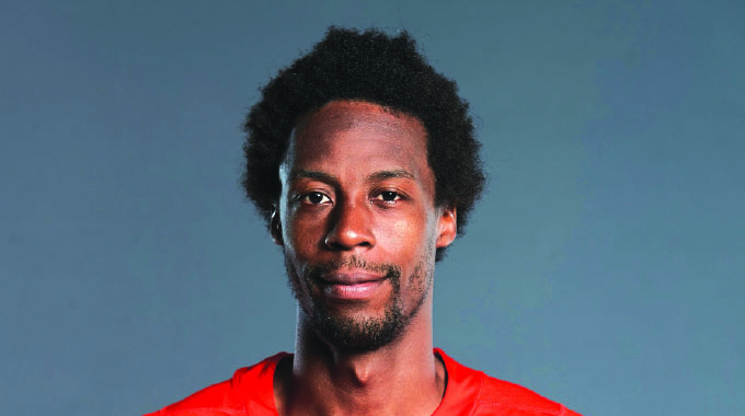 Monfils in five-set comeback victory at French Open
