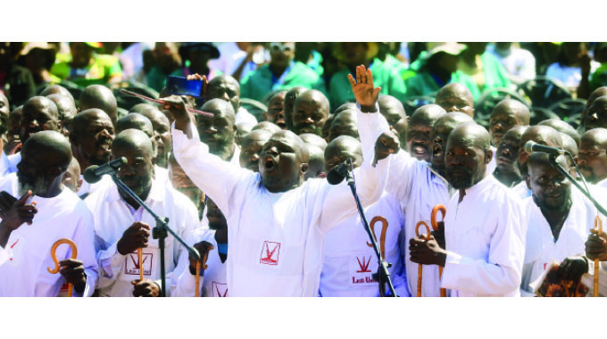 Johane Marange behind President