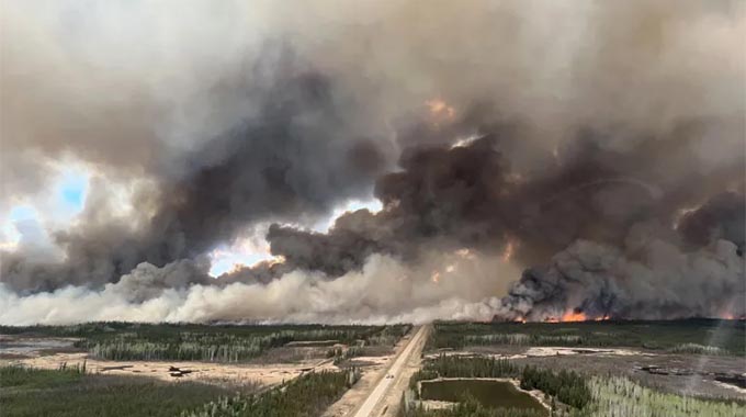 Wildfires force evacuation of thousands in Canada