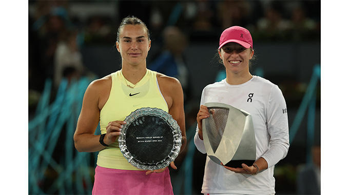Swiatek outlasts Sabalenka in marathon final
