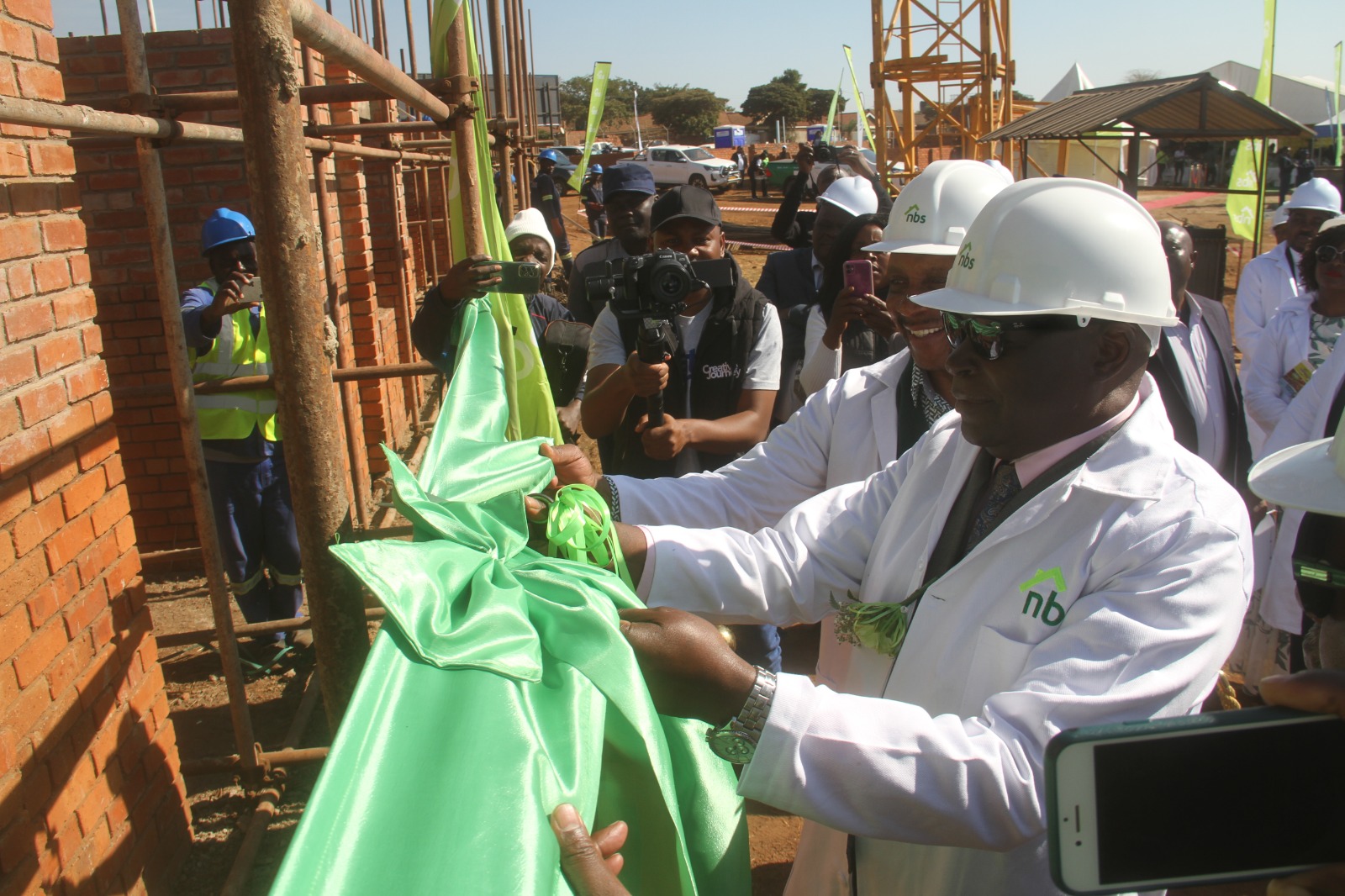 Two NBS flats to benefit 64 families