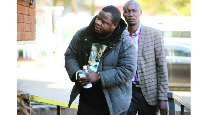 US$238 000 robbery suspect in court