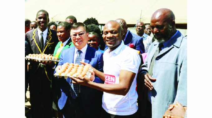 China, TRM donate layers, eggs