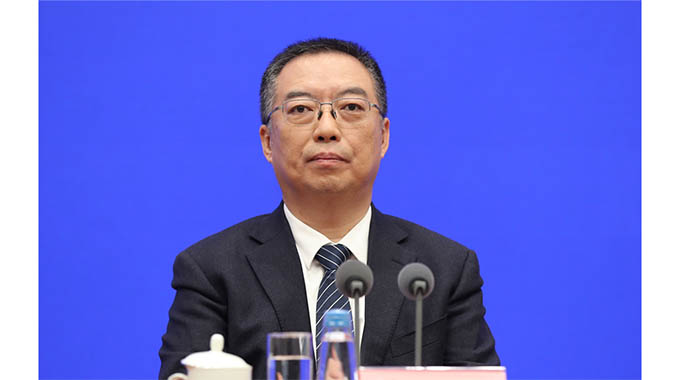 China promises greater market openness