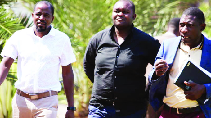 Head in court for exam scandal