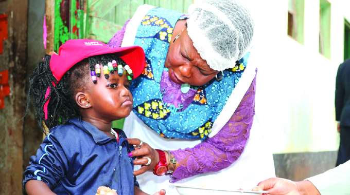 First Lady takes school feeding programme to Zaka