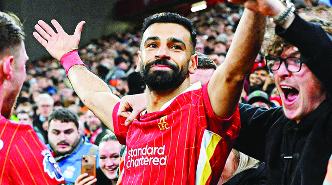 Liverpool extend lead at the top