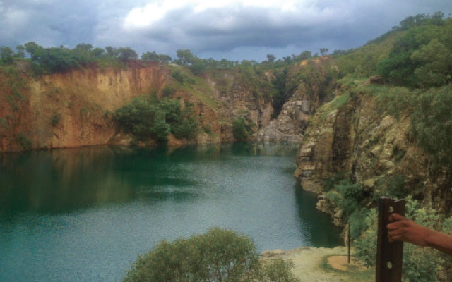 Cliff diving right in Mutorashanga green pool