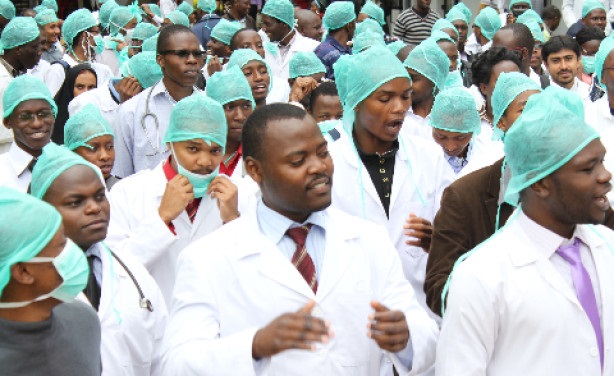Address the restive labour issue